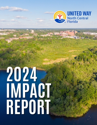 2024 Impact Report Cover Photo featuring an aerial view of Paynes Prairie with the University of Florida in the background